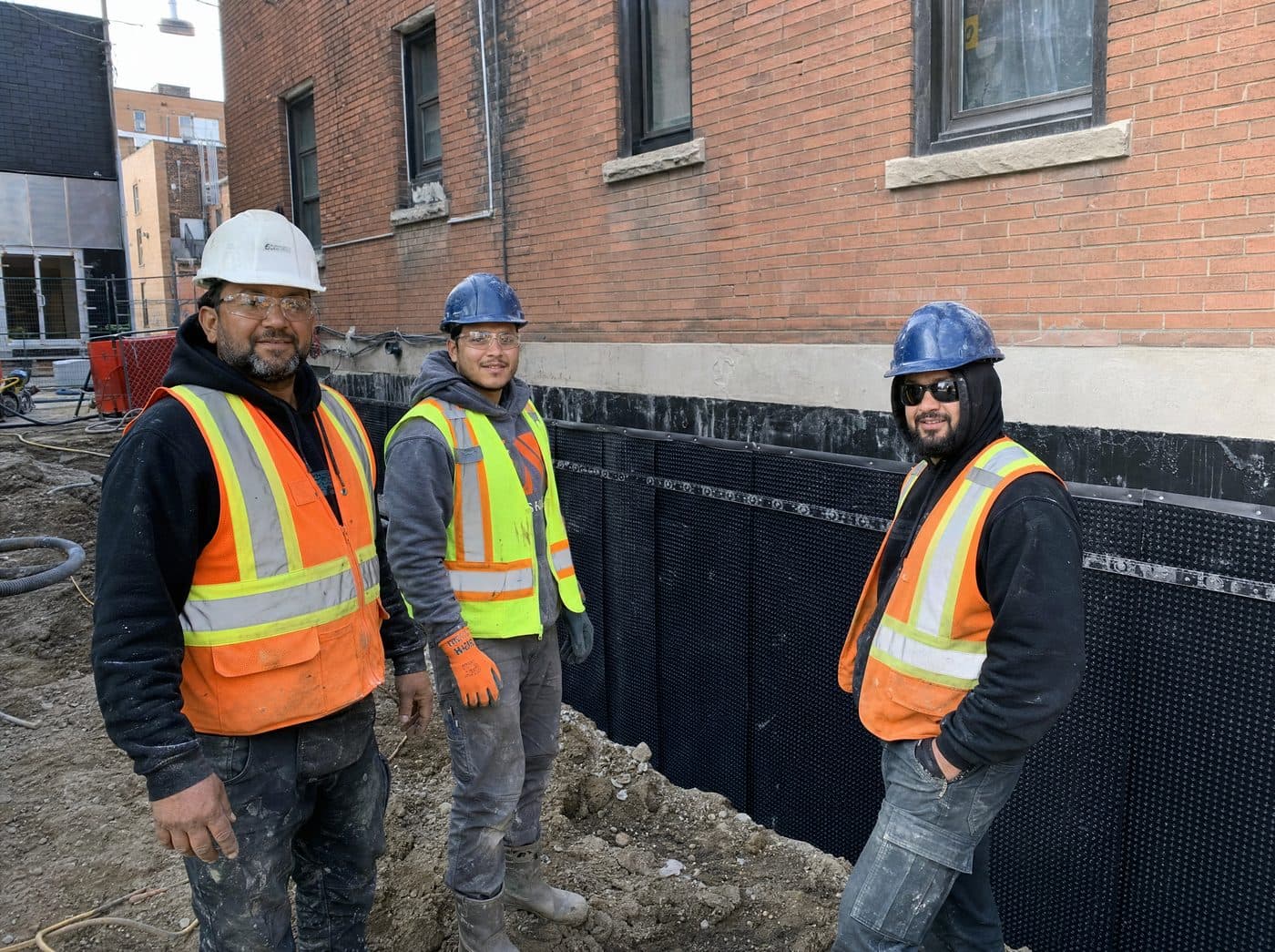 CWC Commercial Waterproofing crew at a Toronto multi-unit construction site