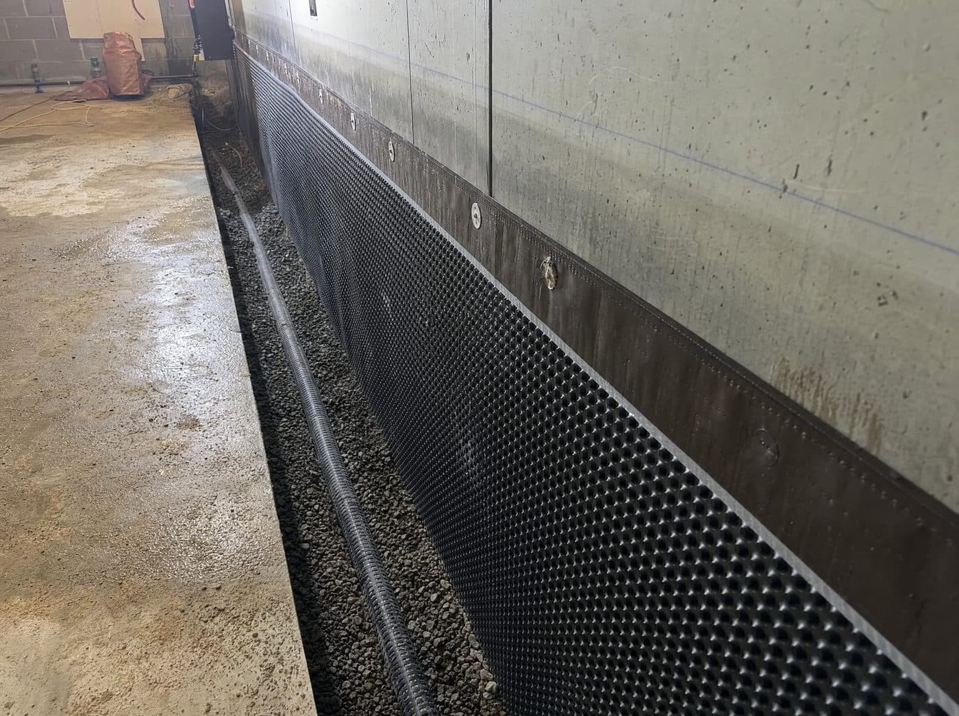 Interior commercial basement waterproofing drainage system in North York