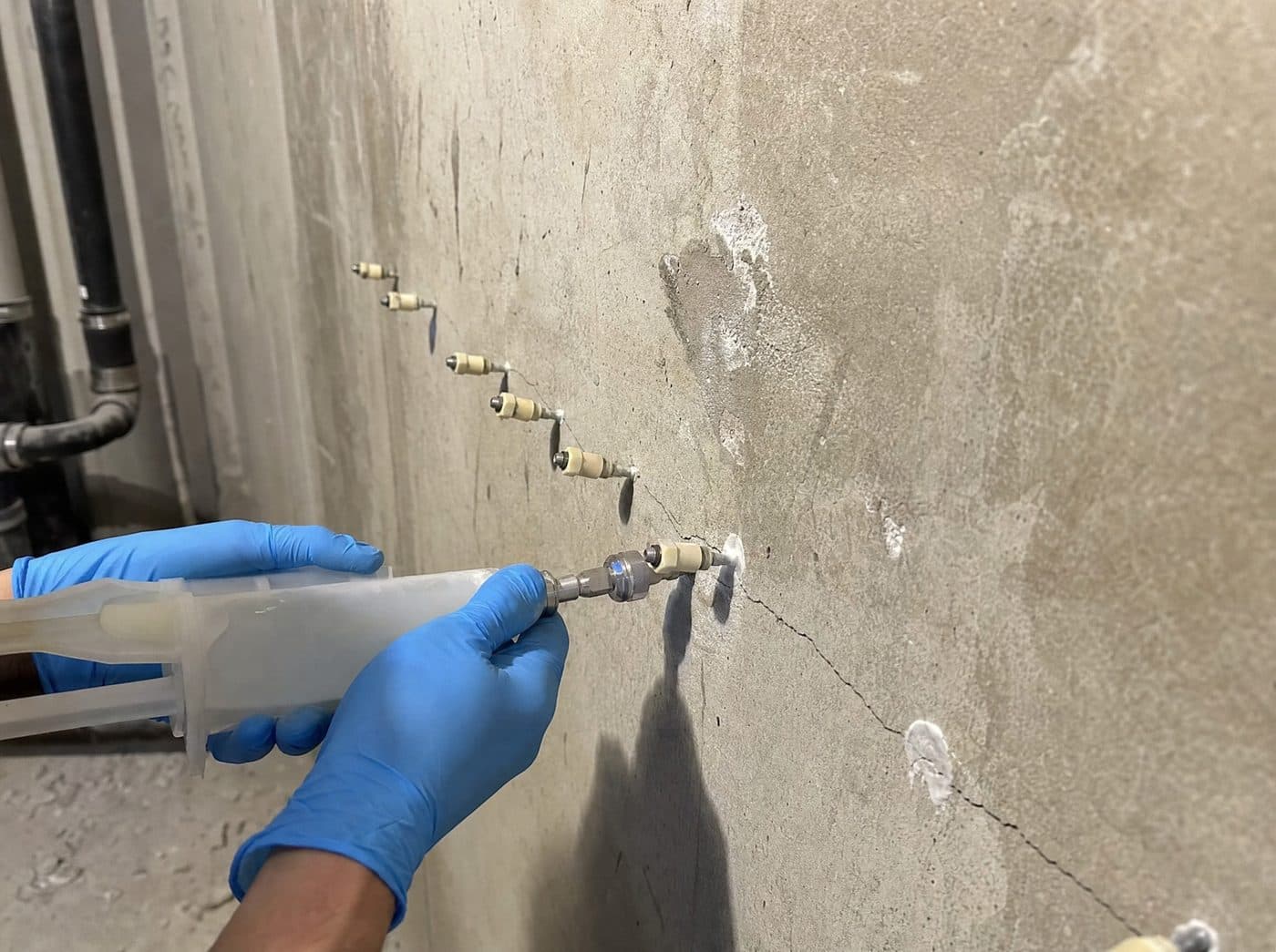 Foundation crack injection repair on a Scarborough commercial wall