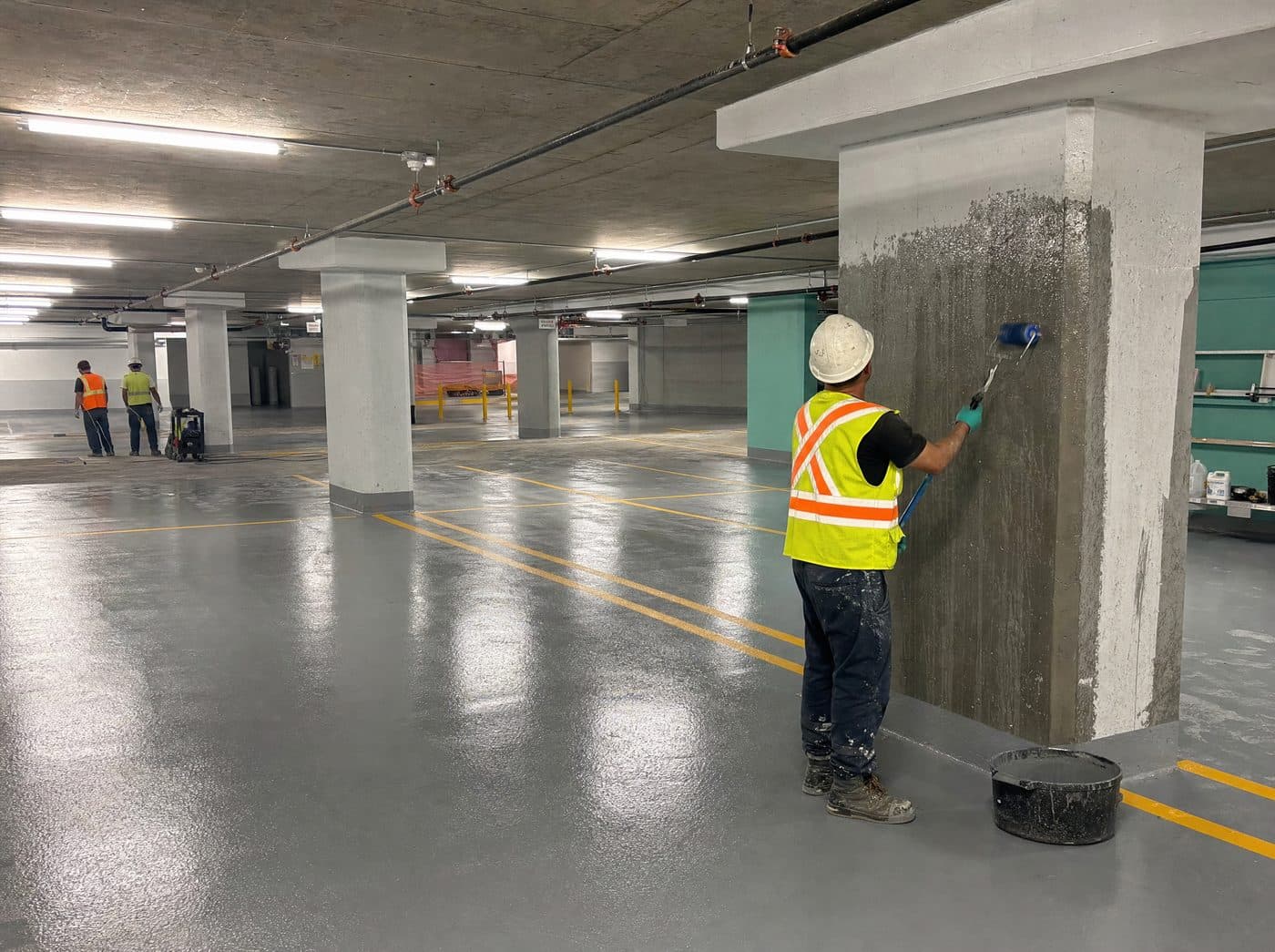 Parking garage traffic coating and waterproofing membrane in a Toronto condo garage